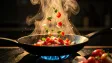 A sizzling pan cooking thumbnail with flying ingredients