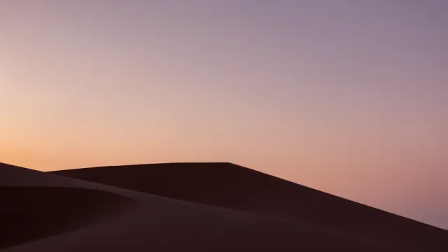 Minimal two-tone desert dunes at dusk desktop wallpaper